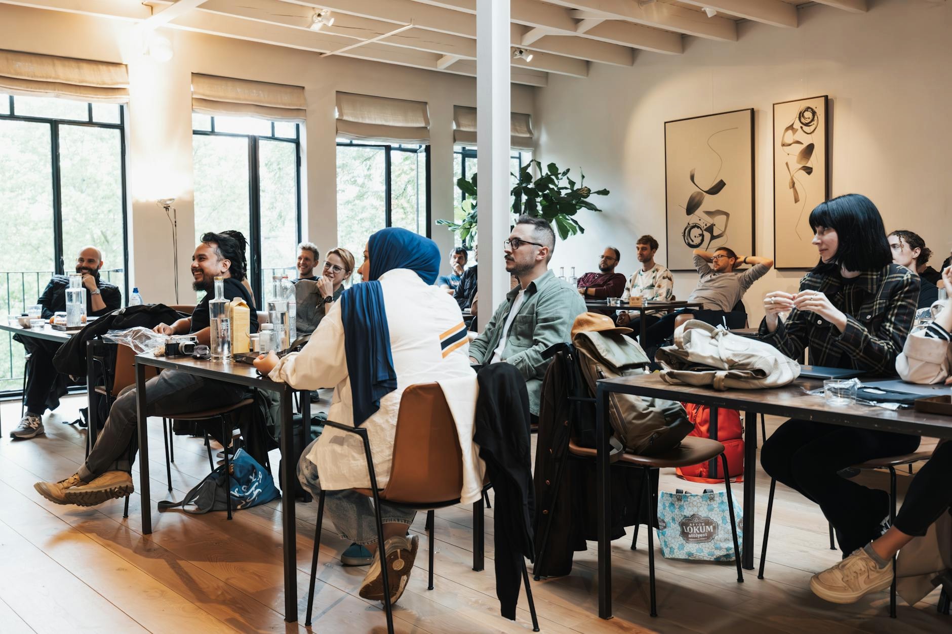 Group workshop for guardians learning about education resources